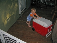  Pusing the neighbor's cooler on the deck