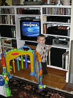  The first thing Isaac did at dad's was to turn on the tv and the dvd player